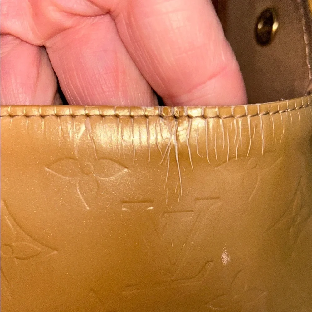 LOUIS VUITTON Gold Tote with Iconic Embossed Design